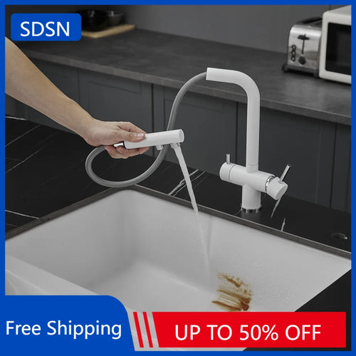 Pull-out white kitchen sink faucet with handheld sprayer, water flowing into sink