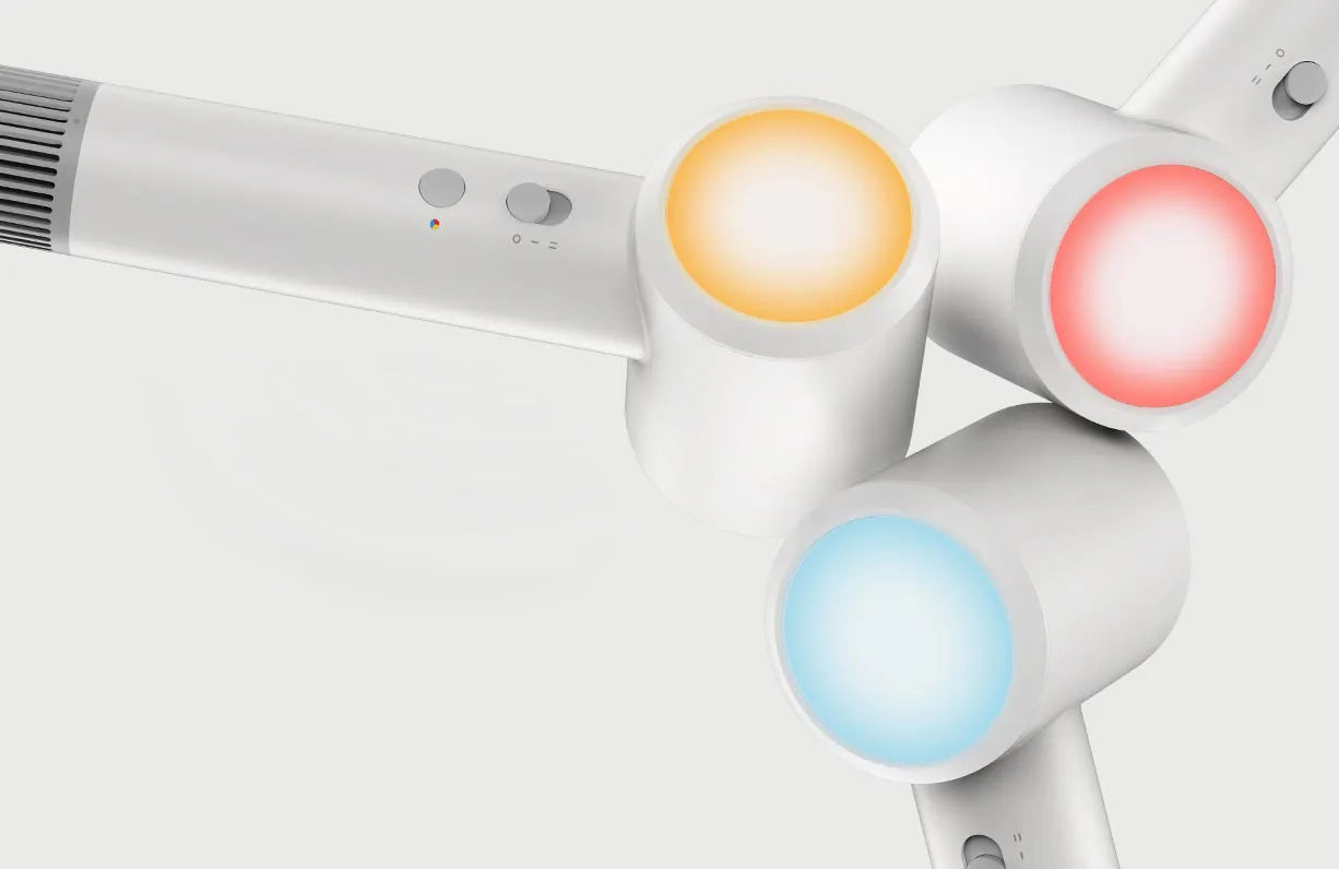 White MIJIA H501 SE high-speed hair dryer showing three units with colorful temperature LED light indicators.