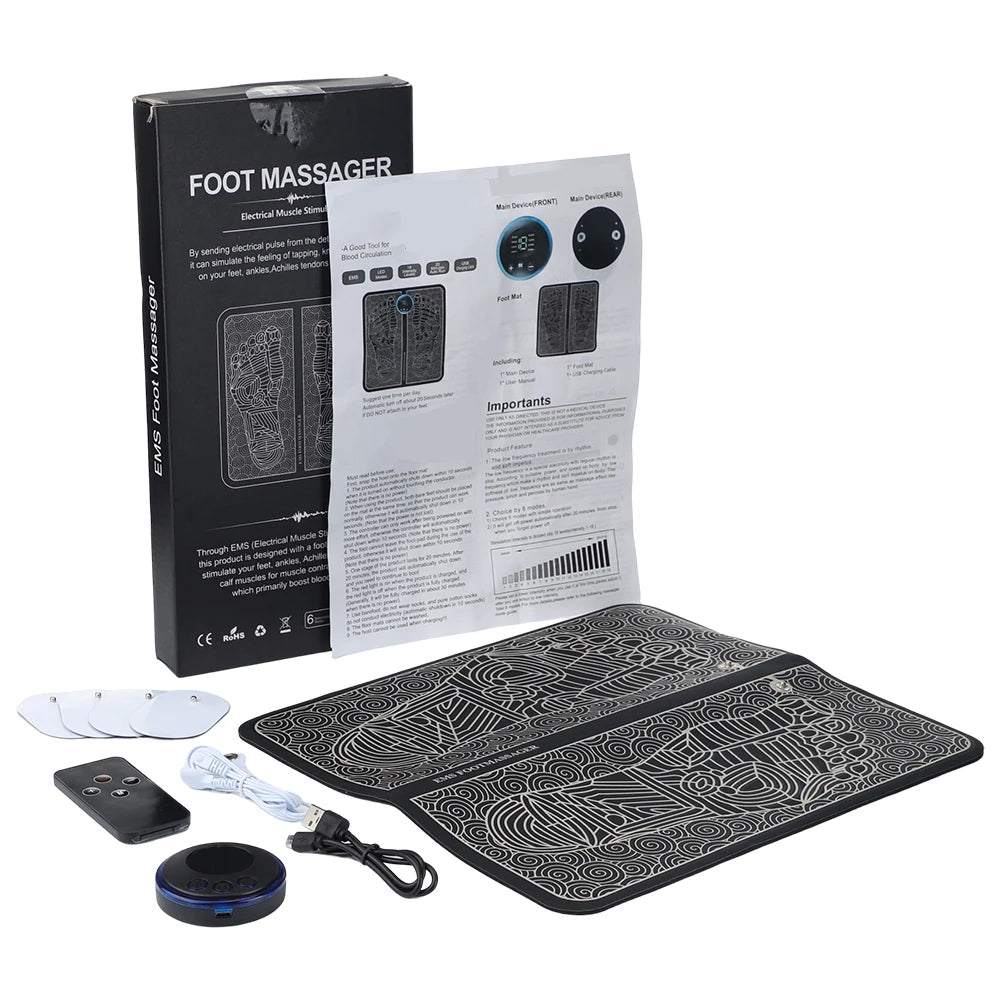 EMS foot massager set with black patterned floor mat, round control unit, remote, USB cable, and adhesive pads.