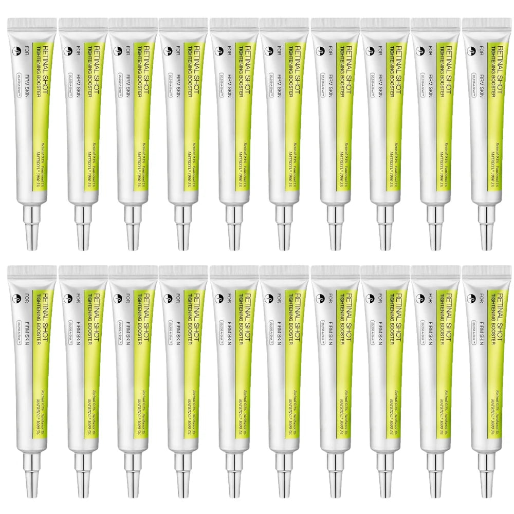 Multiple white and lime green serum squeeze tubes arranged in two rows