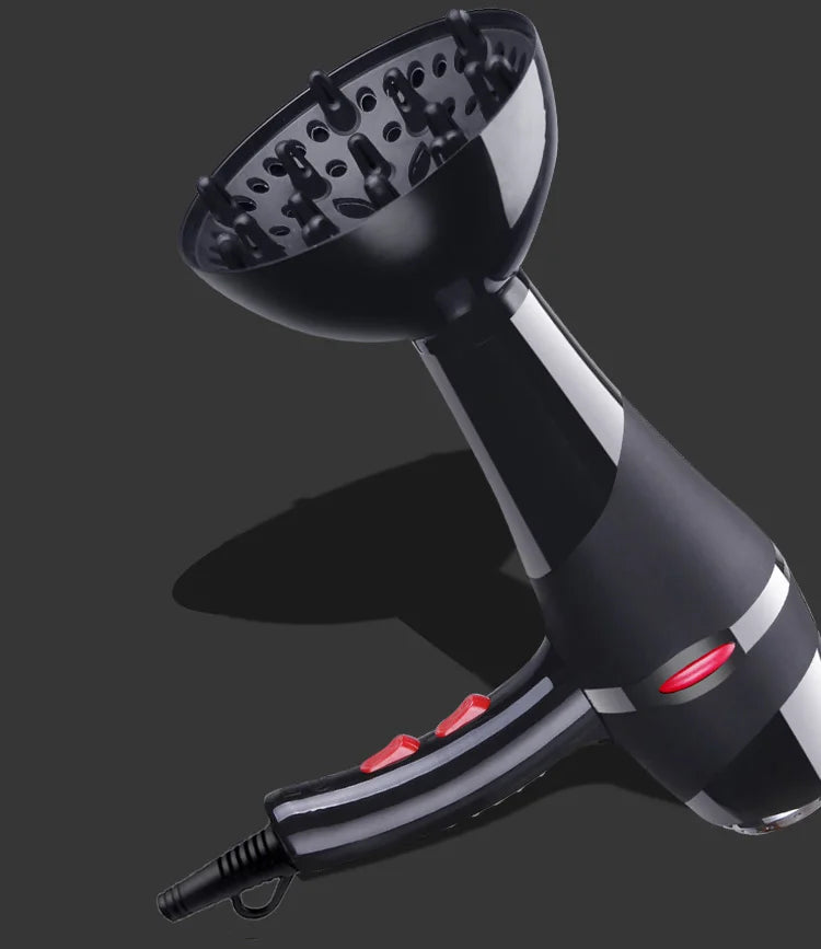 Black professional 2100W hair dryer with diffuser attachment and red speed control buttons for salon-style drying.