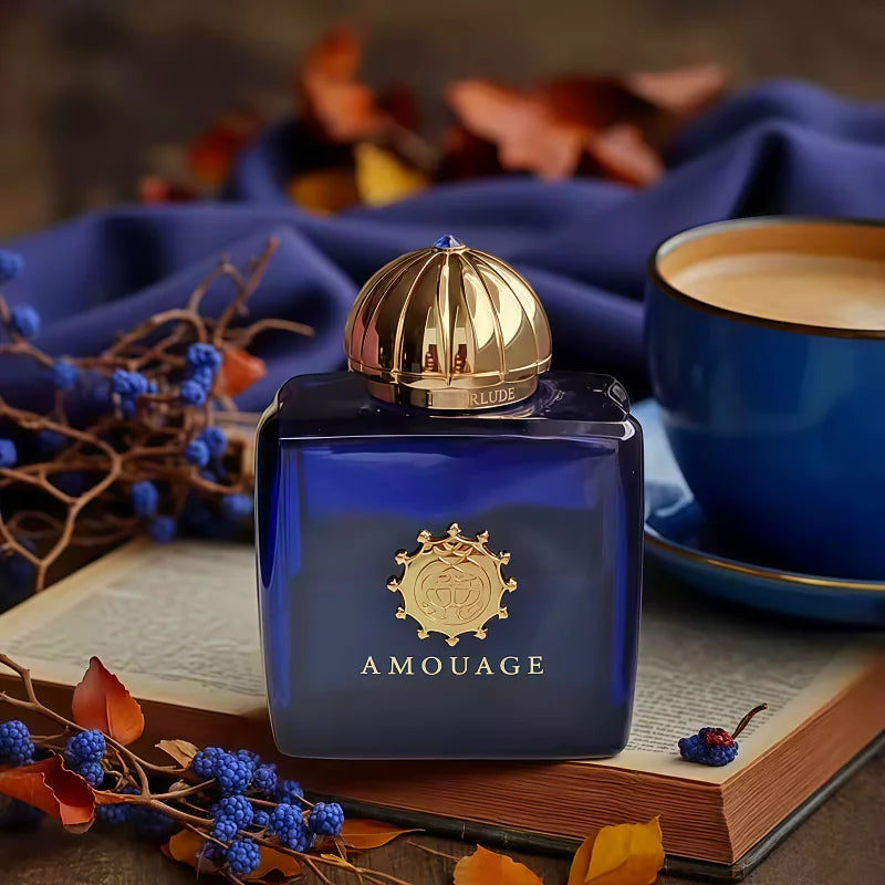 Amouage Interlude EDP unisex perfume: 100ml blue square glass bottle with gold dome cap, luxury woody oriental scent.
