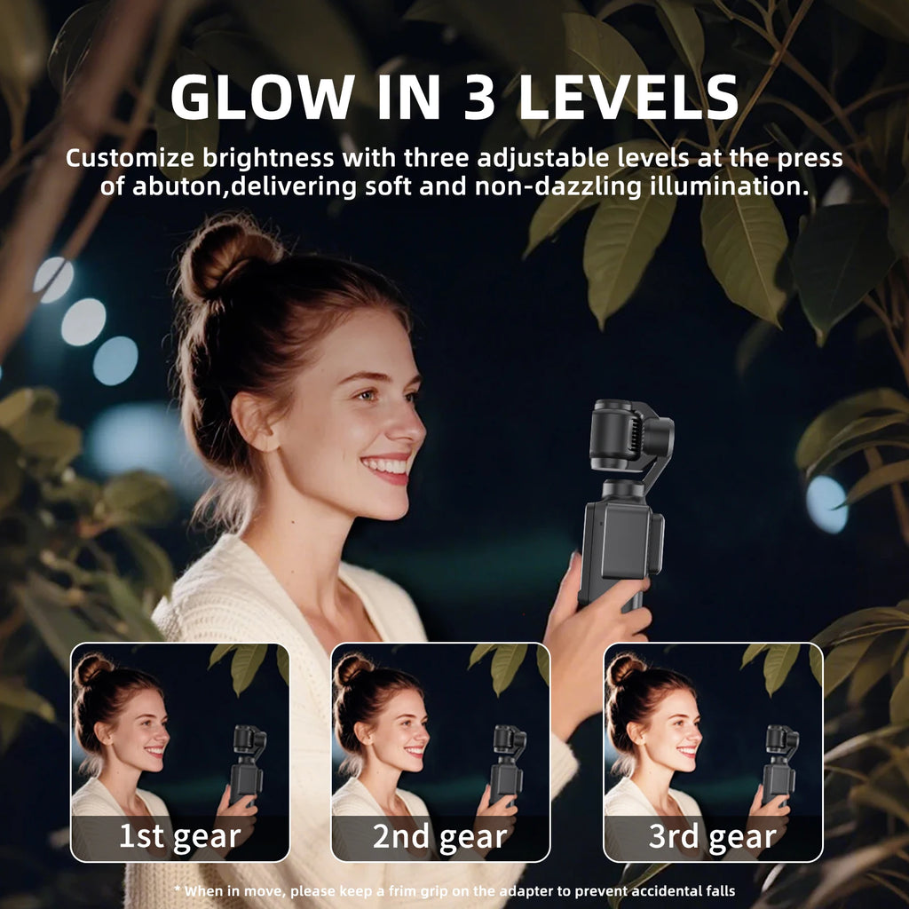 Black handheld gimbal camera with three adjustable brightness levels for nighttime video recording.
