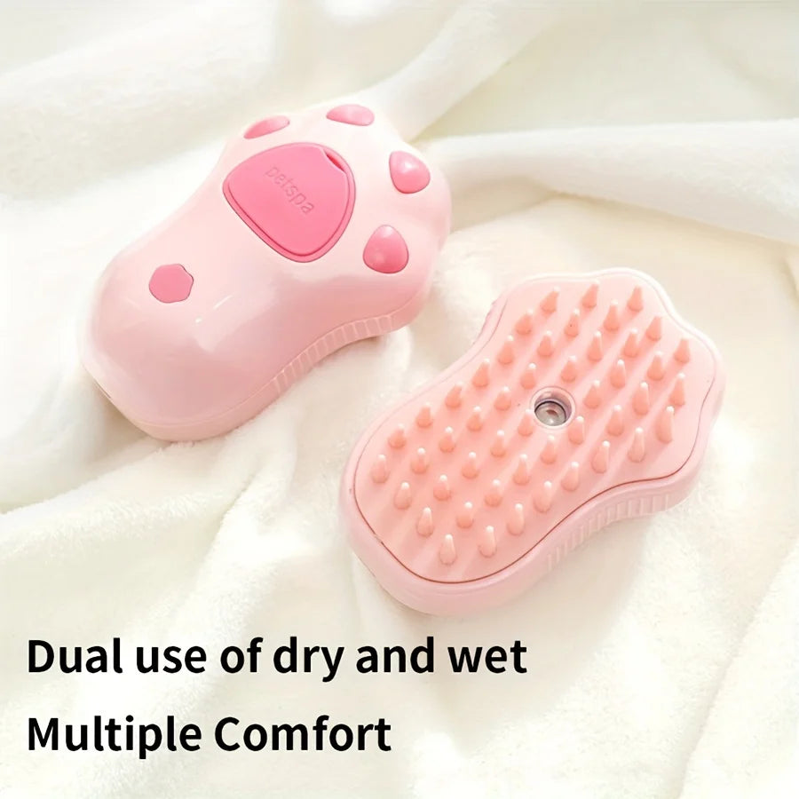 Pink 3-in-1 electric steam pet grooming brush for cat and dog hair removal, massage, and easy deshedding.