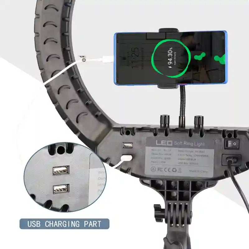 Black LED ring light with a center smartphone mount, USB charging ports, and power cable for content creation.