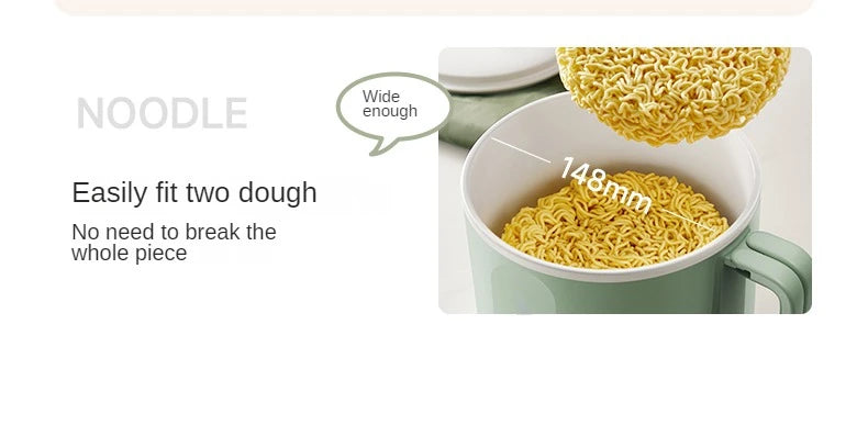 Mint green electric hot pot with wide opening, noodles filling the inner bowl