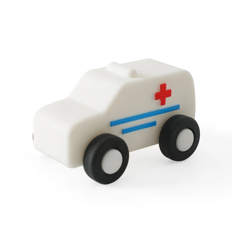 White ambulance teething toy made of natural rubber for baby teething relief.