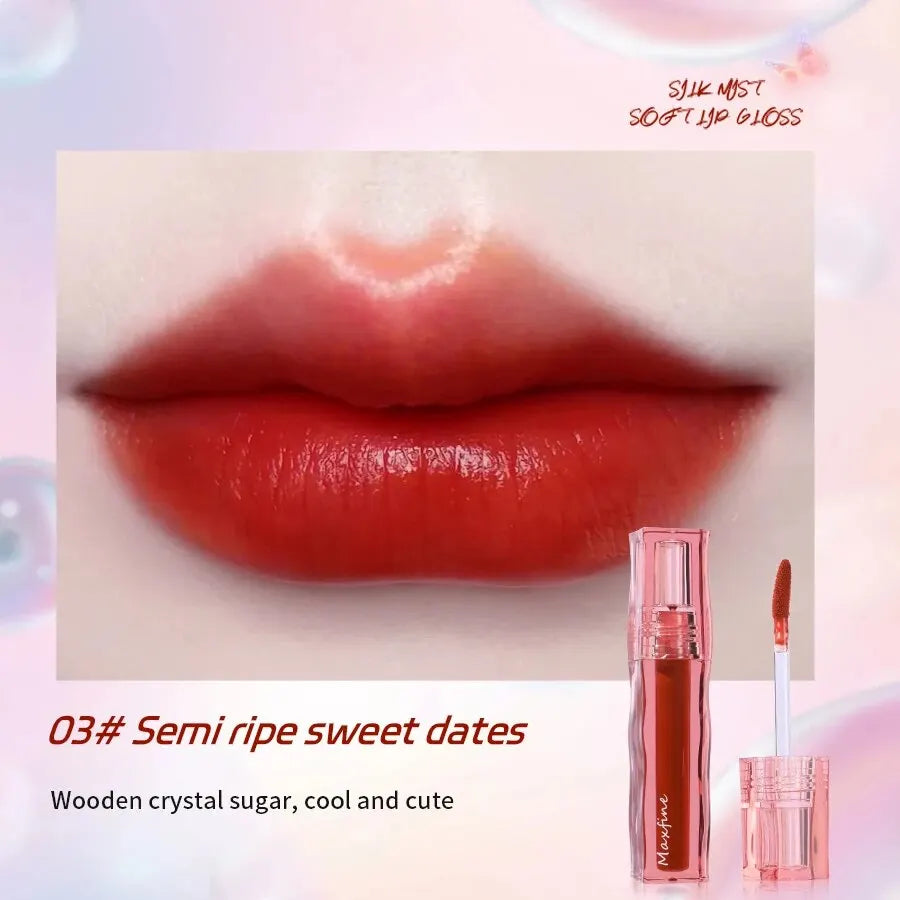 Moisturizing liquid lipstick in Semi-Ripe Sweet Dates, a long-wearing, non-stick, glossy red lip glaze with applicator.