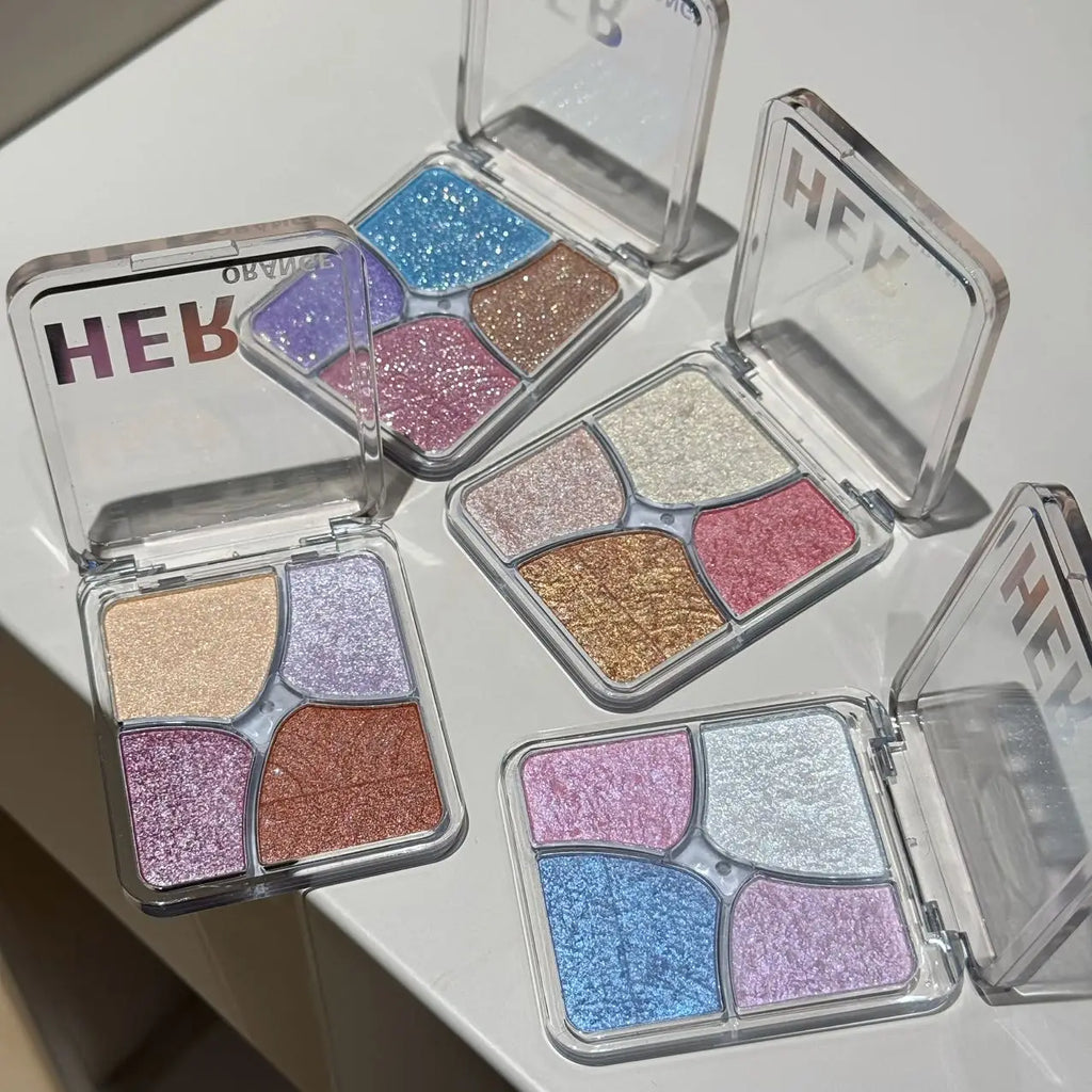 Tidesmit Herorange 4-in-1 face makeup palette featuring eyeshadow highlighter blush and brightener texture close-up