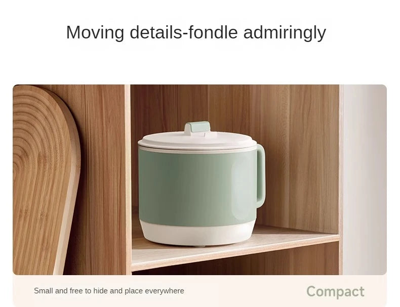 Compact mint green electric hot pot with white lid and handle, designed for storage