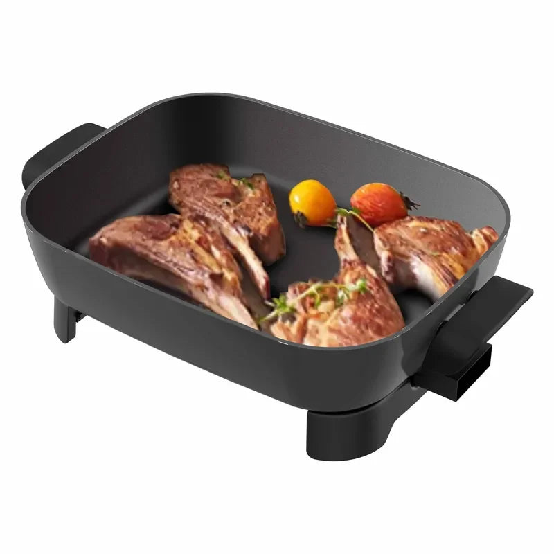 Large nonstick electric frying pan with open cooking surface and side handles