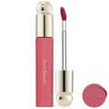 Rare Beauty matte lipstick in pink with applicator, showing smooth, rich texture and a creamy lip makeup swatch.
