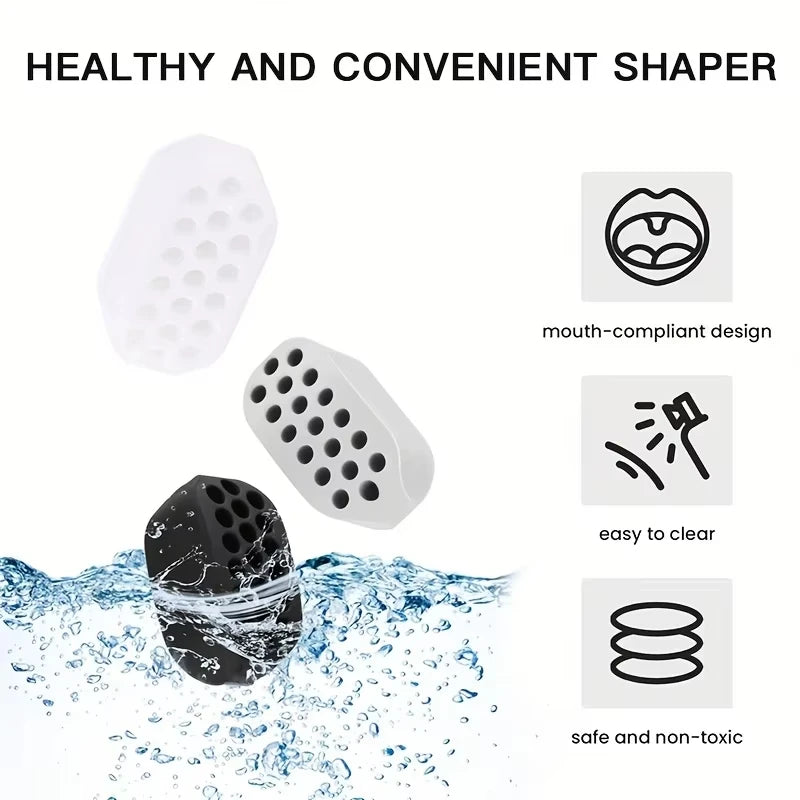 Jawline shaper in black, white, and grey silicone with a perforated design for oral facial muscle exercise.