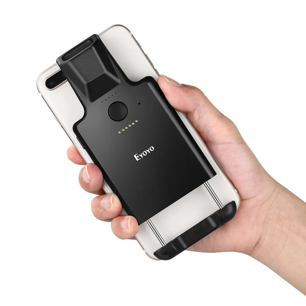 Phone clip 2D barcode scanner with black body and side grip, handheld in use