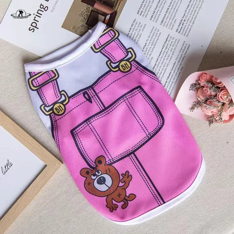 Pink cartoon puppy vest shirt for small dogs, breathable summer pet clothing with cute bear print and overall design.