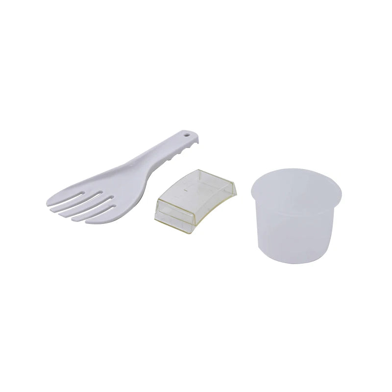 Included cooker accessories set: serving utensil, small scoop, and measuring cup