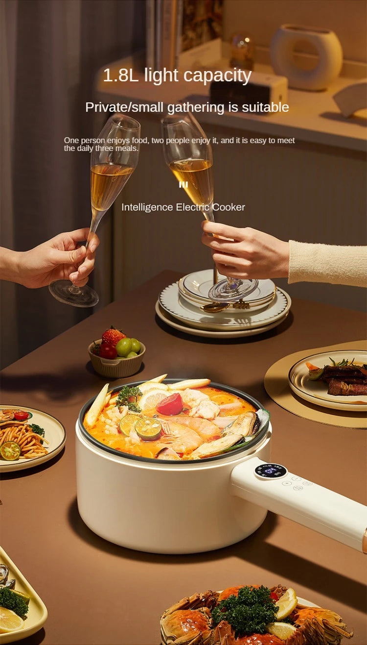 Electric multi cooker on table with serving dishes and hands toasting with glasses