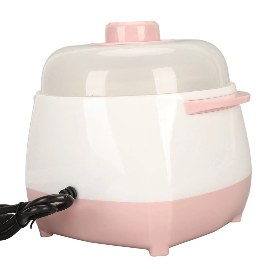 Pink and white mini electric rice cooker with clear lid, side handle, and plug connection