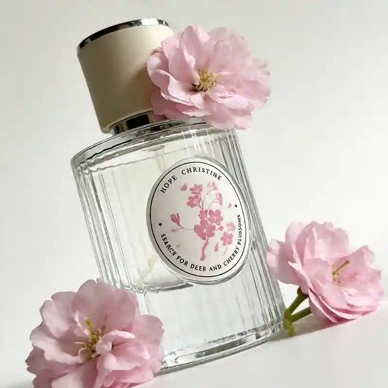 Hope Christine Cherry Blossom perfume, a long-lasting luxury floral scent for women in a ribbed glass bottle.