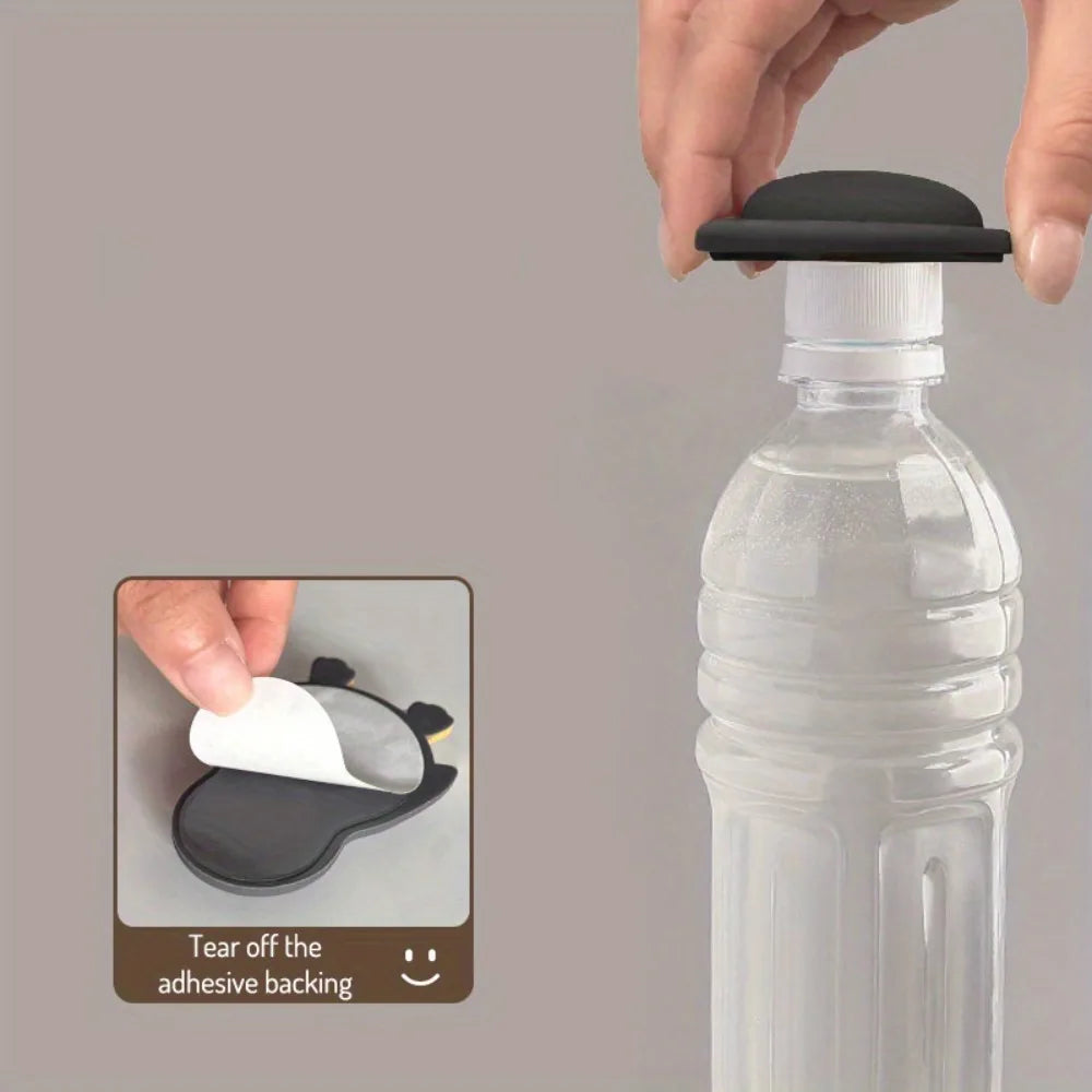 Self-adhesive 3D animal door stopper bumper for furniture and walls to prevent pet collision and damage.
