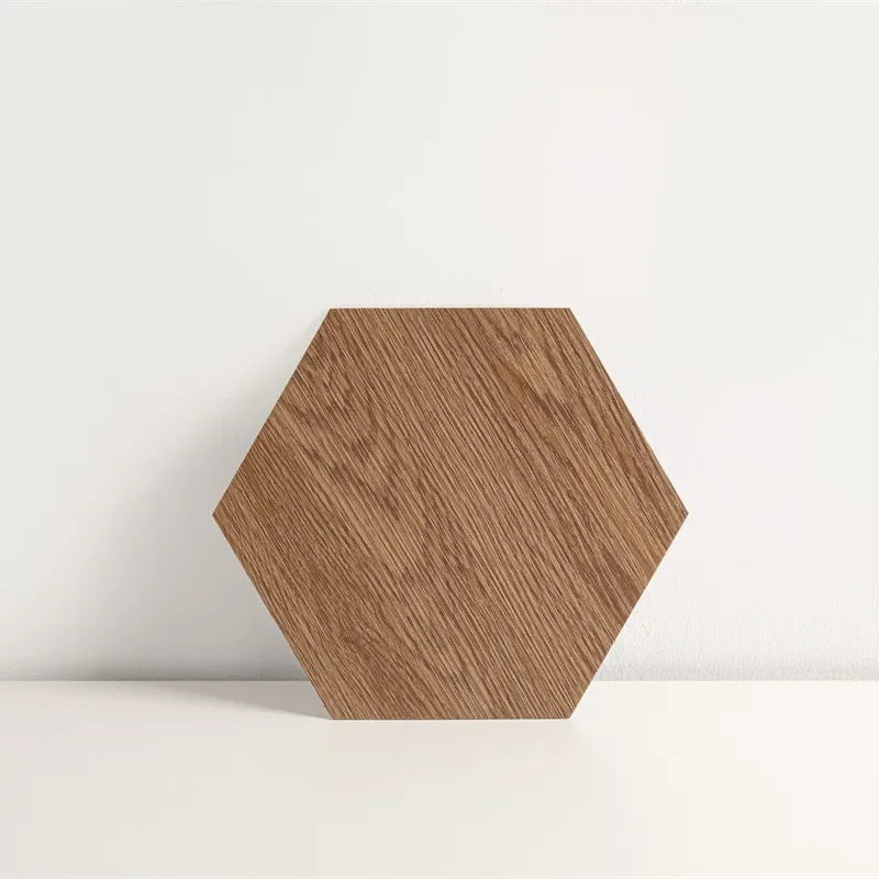 Hexagon wood-grain vinyl peel-and-stick floor tile, medium brown with visible wood streaks