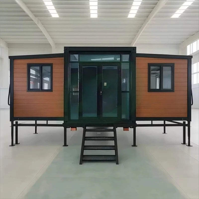 Steel prefab container house front with double dark doors and rectangular windows