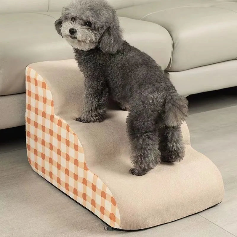 Dog on anti-slip, beige memory foam pet stairs. Washable 2-step ladder for safe, easy access to high sofas.