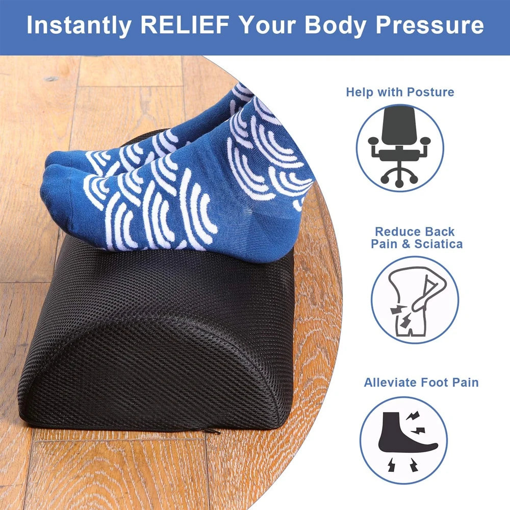 Black memory foam under-desk foot rest with washable mesh cover for posture support and pain relief at work or home.