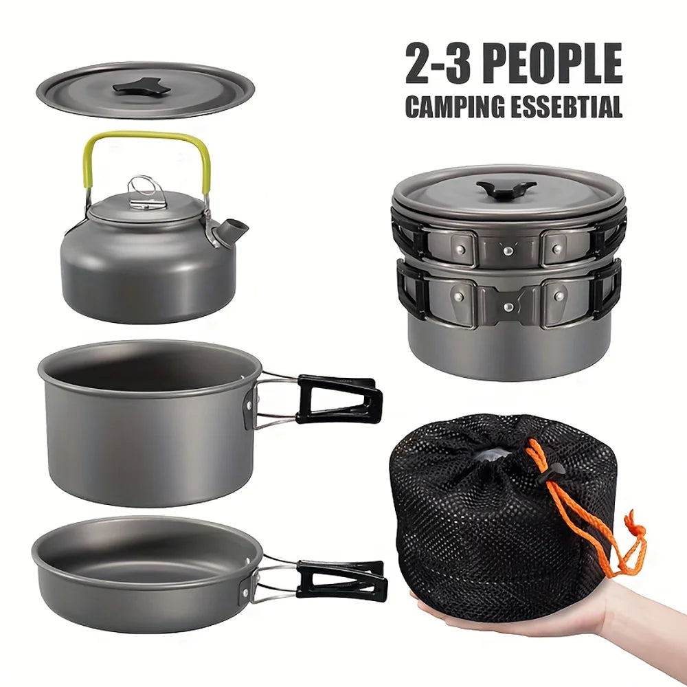 Aluminum camping cookware set with kettle, nested pots, and black mesh storage bag