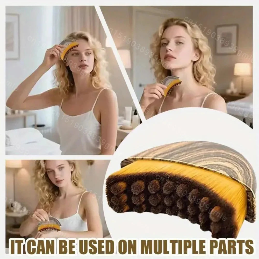 A woman uses a curved, wood-patterned lymphatic face brush with soft, dense brown and yellow bristles on her face.