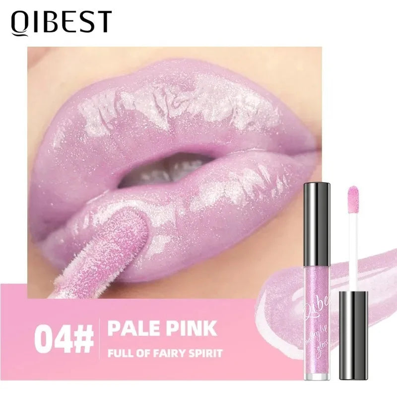 Shimmering taro purple lip gloss with gold sparkle and glassy, plumping jelly shine on lips.