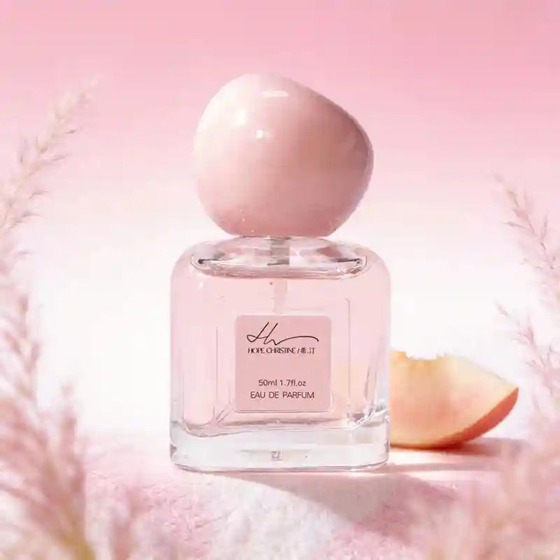 HOPE CHRISTINE Peach Eau de Parfum for women: 50ml square bottle with pink round cap, floral-fruity aesthetic.