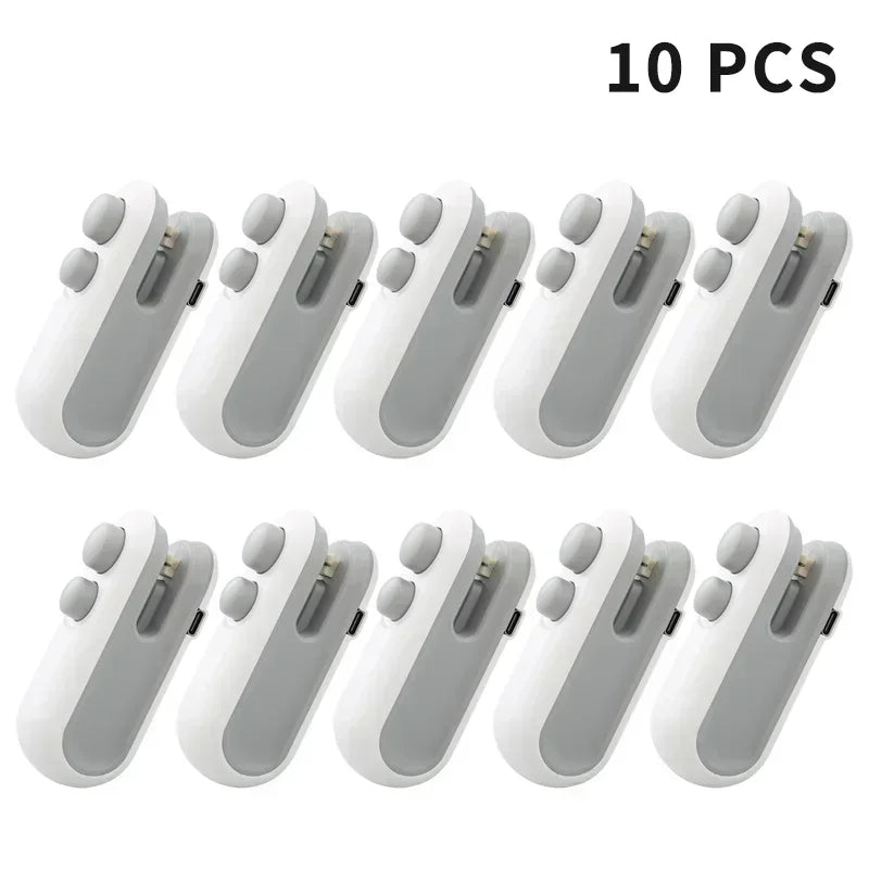 Set of ten white portable handheld bag sealers with compact design