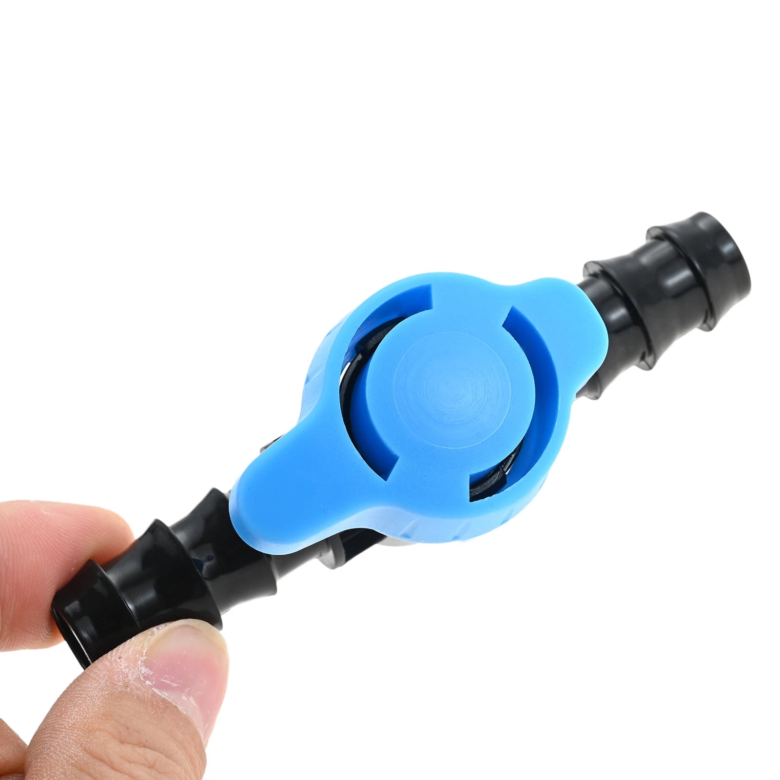 Hand shows 1/2 in drip irrigation valve, blue latch, black barbed ends