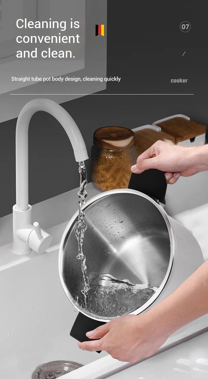 Stainless pressure cooker pot being rinsed with running water for easy cleaning