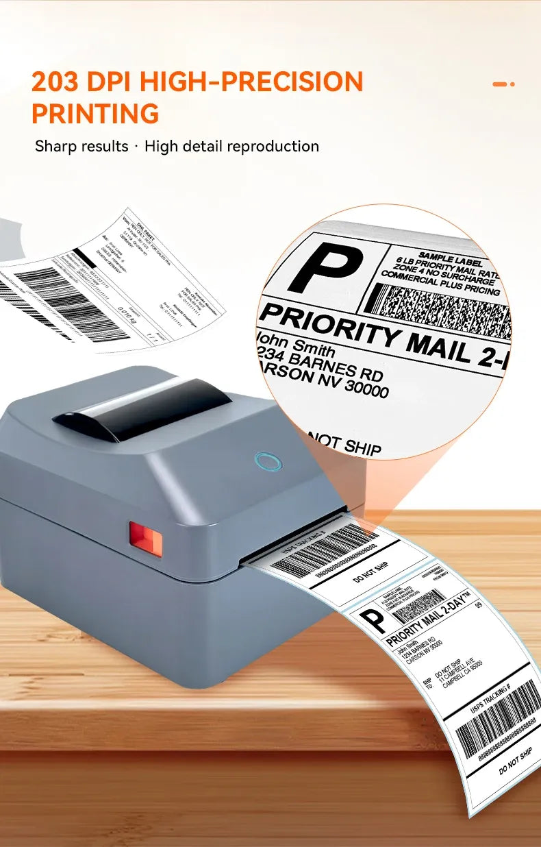 Gray 4-inch thermal label printer printing clear barcode shipping labels