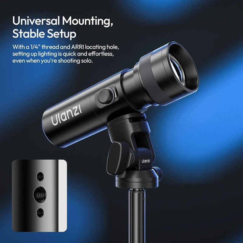 Black cylindrical LED light mounted on a small tripod with a 1/4-inch threaded hole for mounting.