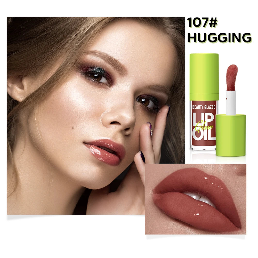 Model wearing 107 Hugging nude candy lip gloss, a moisturizing, lustrous mirror-finish lip stain with high shine.