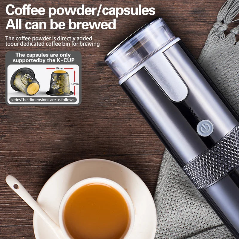 Portable black and silver coffee maker for coffee grounds and K-Cup capsules on a wooden table with a coffee cup.