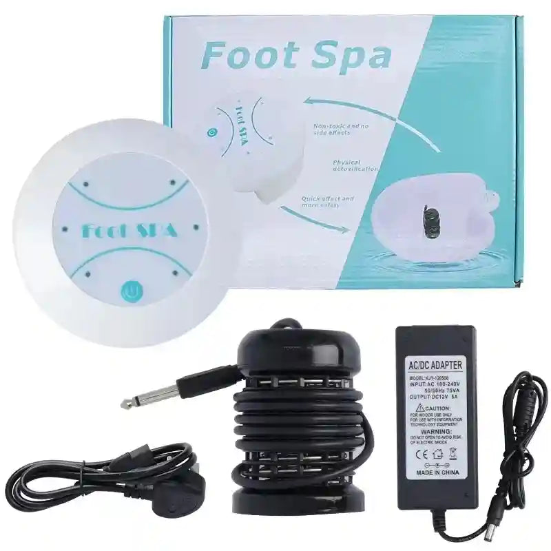 Ionic foot detox spa machine kit with white circular controller, black electrode array, power adapter, and retail box.