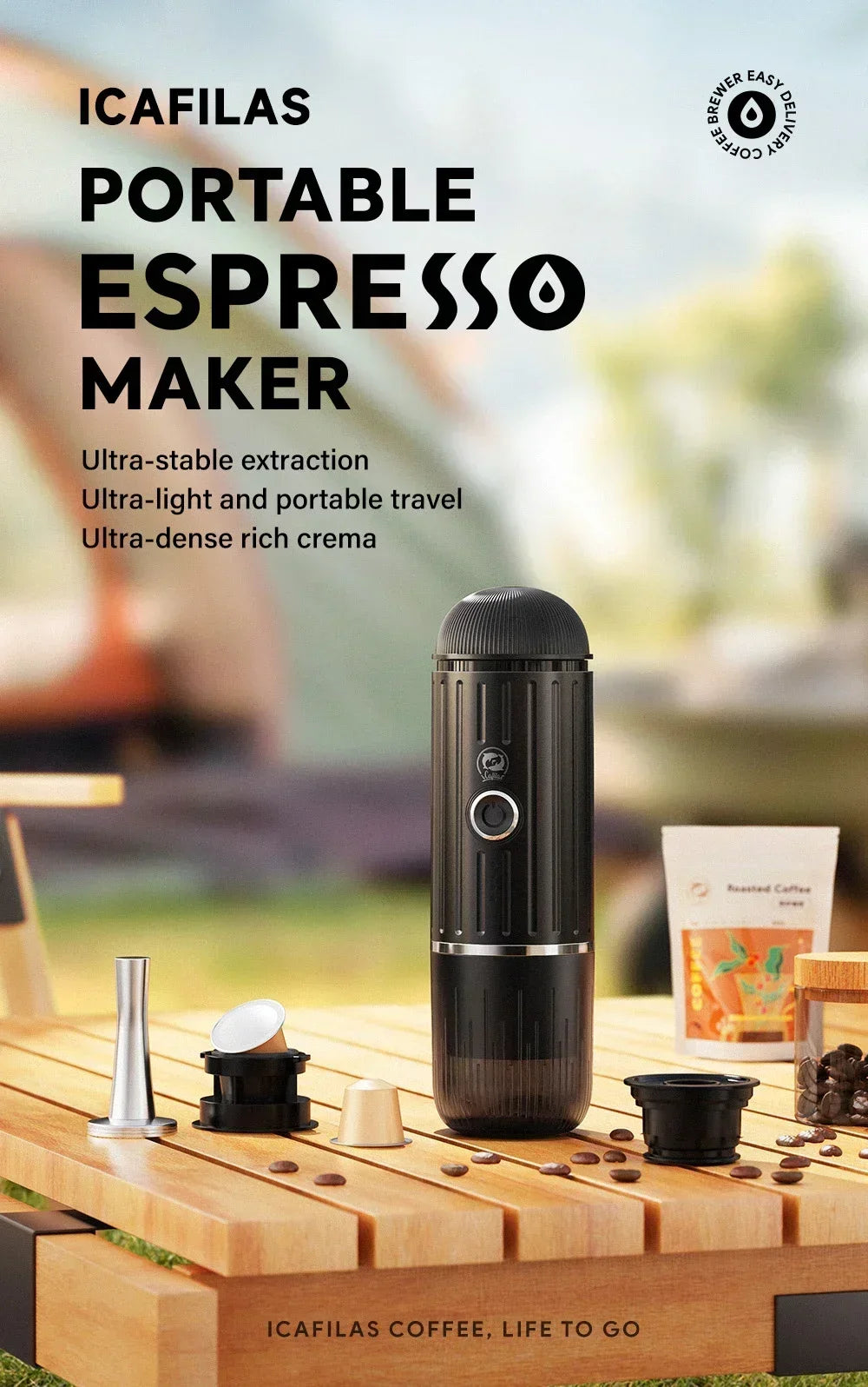 Icafilas black portable espresso maker with accessories on a wooden table, designed for travel and rich crema.