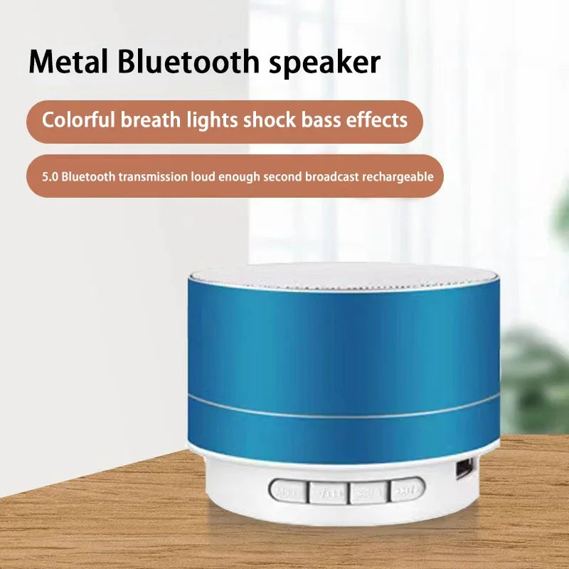 Portable Bluetooth speaker with blue metal body and white control base