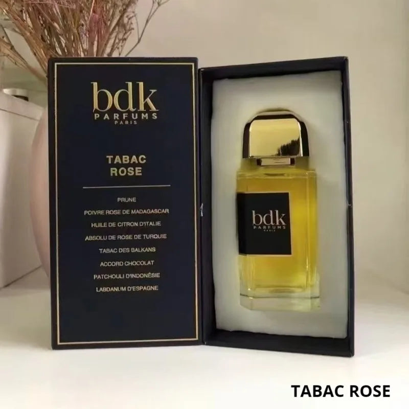 BDK Parfums Tabac Rose 100ml: luxury unisex EDP, rose & tobacco notes, gold-capped rectangular glass bottle in gift box.