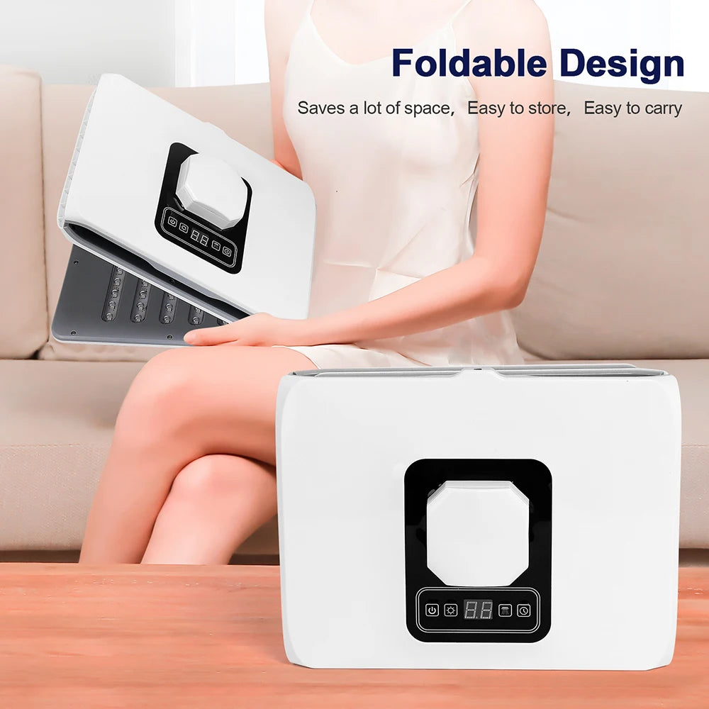 Foldable white plastic foot bath tub with a black digital control panel, shown folded for storage on a table.