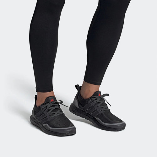 Adidas UltraBOOST EG8105 unisex sneakers in black with breathable mesh, lace-up closure, and responsive Boost midsole.