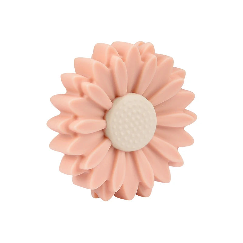Pink flower baby teething toy made of soft silicone for soothing infant gum pain relief.