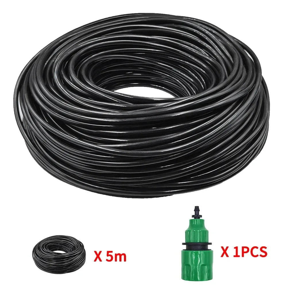 Black drip irrigation PVC hose coil with green connector, 5 m