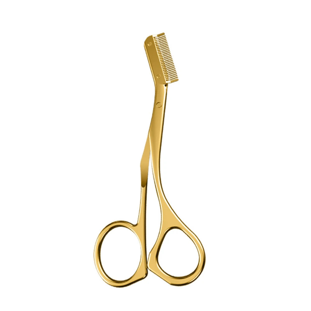 Gold stainless steel eyebrow trimmer scissors with a built-in grooming comb for professional makeup shaping.