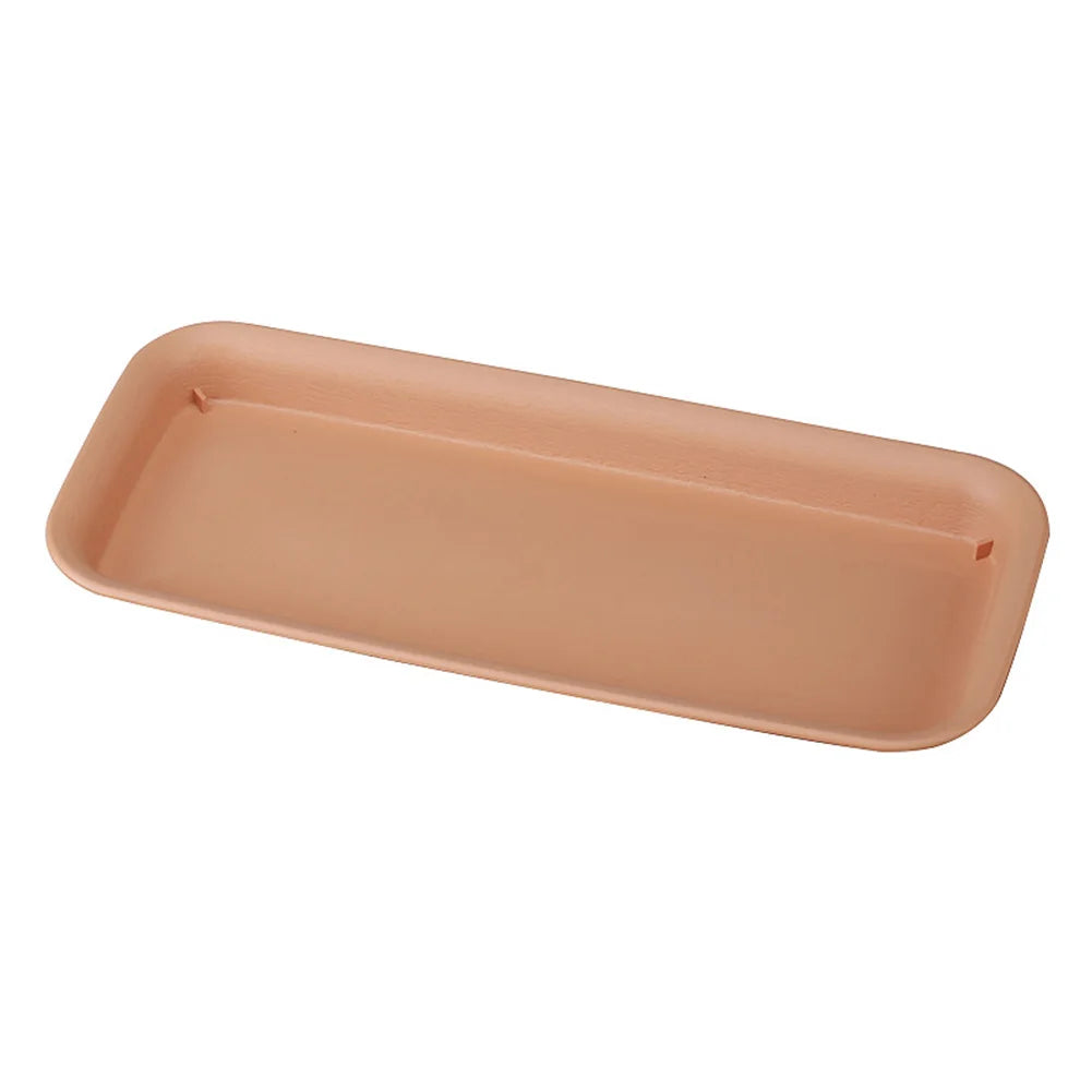 Rectangular plastic plant tray, terracotta-brown, close angled view