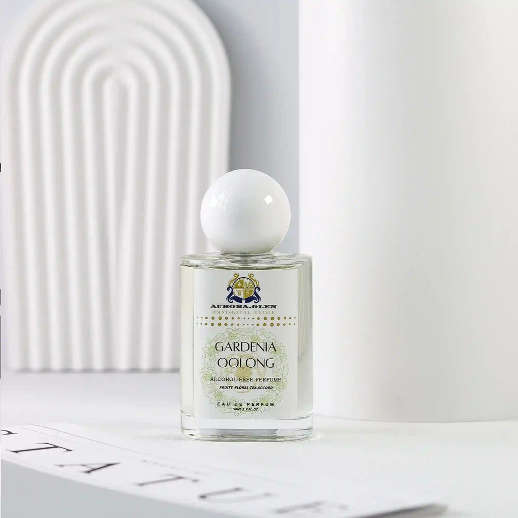 Aurora Glen Gardenia Oolong EDP perfume: unisex floral tea scent in a round-capped glass bottle for home fragrance.